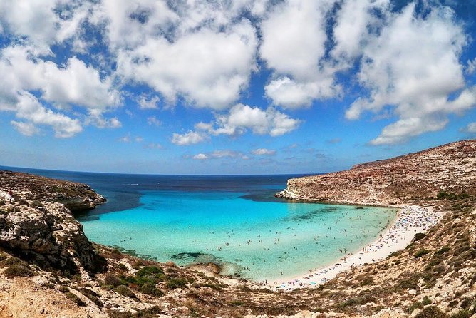 7 hours Boat trip to Lampedusa lunch, SUP and Snorkeling - Heading back past the Lampedusa migration monument