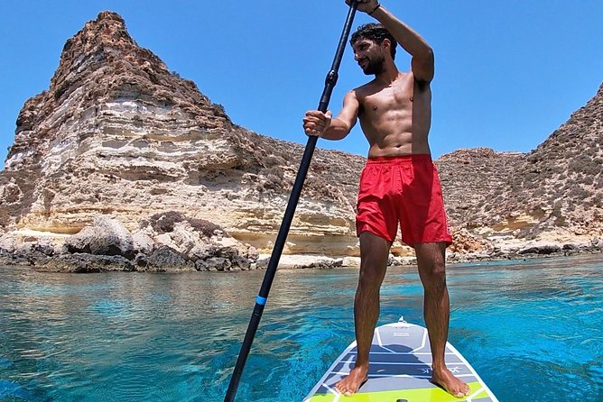 7 hours Boat trip to Lampedusa lunch, SUP and Snorkeling - The crew and the small-group feel (what it changes for you)