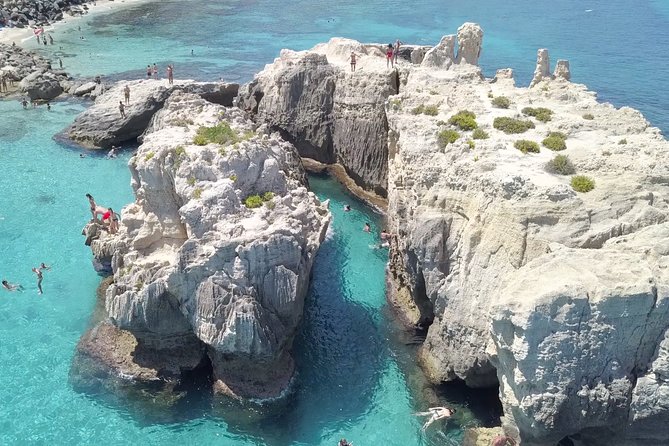 Amazing boat trip from Tropea to Capo Vaticano - 6 to 12 people - IL FARO Capo Vaticano and Spiaggia di Riaci’s natural canyon swim