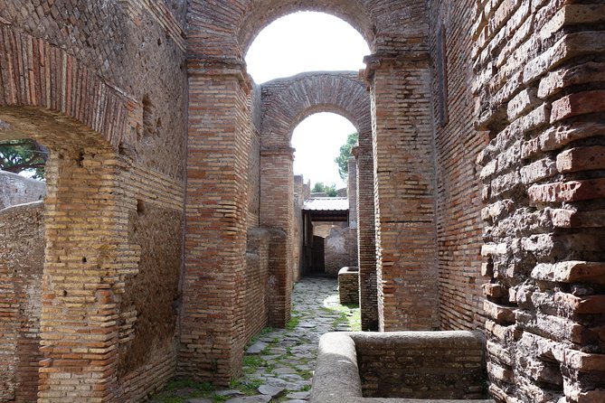 Ancient Ostia Antica Semi-Private Day Trip from Rome by Train with Guide - Decumanus Maximus: The Main Street You’ll Understand Fast