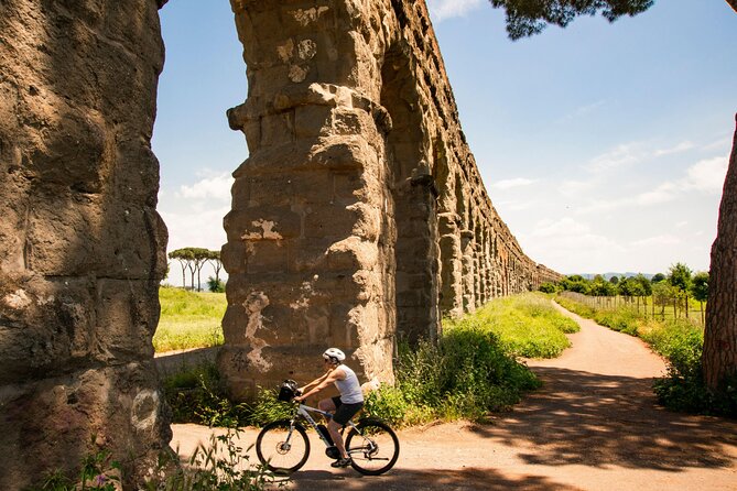 Appian Way, Catacombs and Aqueducts Park Tour with Top E-Bike - First stop: Porta San Sebastiano and the moment Rome changes
