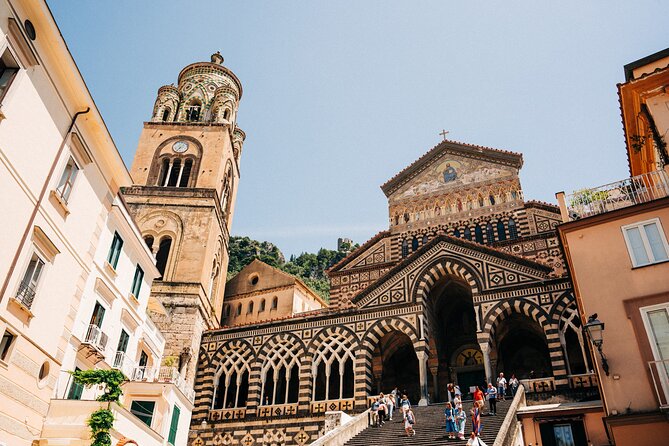 Boat-Hopping On The Amalfi Coast & Positano: Day Trip from Rome - The guide makes the short stops feel long