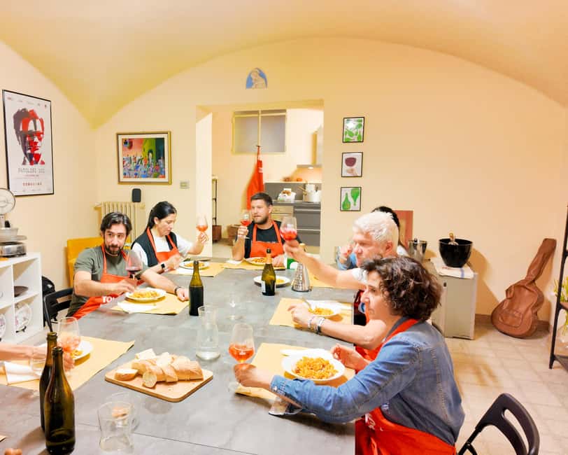 Bologna: Pasta Tagliatelle Ragu Cooking Class with Spritz - Cooking, Toasting, and Serving: Sangiovese at the Table