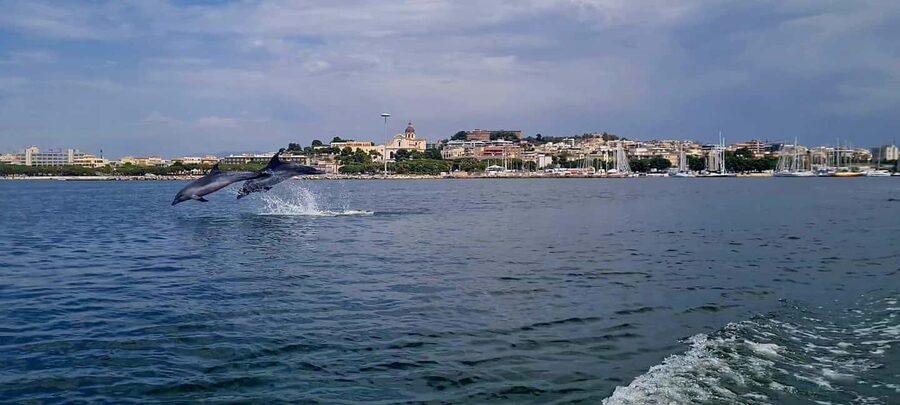 Cagliari: Boat Tour, 4 Stops, Swim, Snorkeling, & 1 Spritz - Getting aboard at Bacan and what the ride is really like