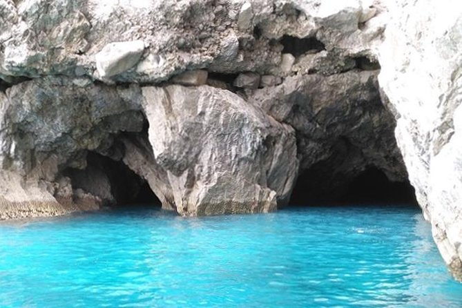 Capri Boat Tour from Sorrento: Swim, Grottos & Light Lunch - Snacks, drinks, and that limoncello send-off