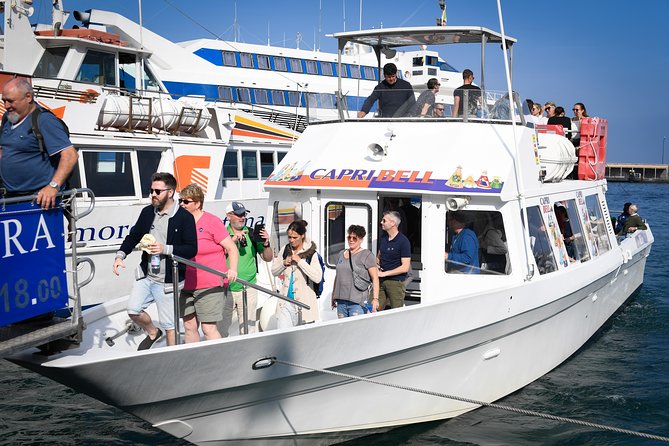 Capri Coast to Coast: Boat Tour with Optional Blue Grotto - Inside the Blue Grotto: How to Avoid the Stress Spiral