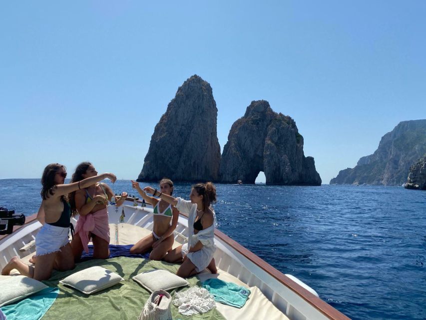 Capri: Island and Grottos Boat Cruise with Snacks and Drinks - Swimming and snorkeling: the cool-down that makes the price feel right