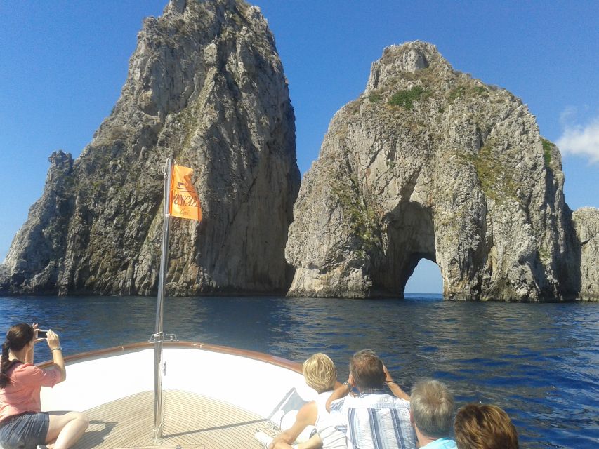 Capri: Island Boat Tour with Blue Grotto Stop - Casa Malaparte and the Faraglioni Rocks up close
