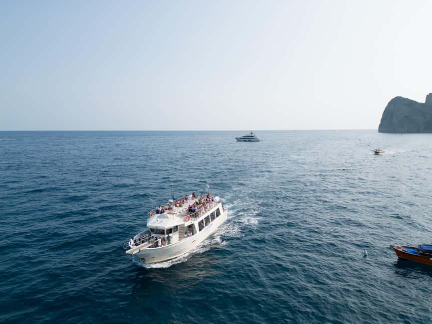 From Sorrento/Nerano: Capri Island Cruise with Guide Onboard - The island cruise: Faraglioni, grottos, and a 90-minute view reset