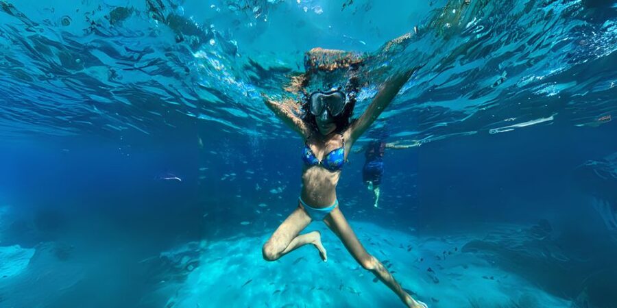 From Trapani: Favignana and Levanzo Egadi Island Day Cruise - First swim: Cala Azzurra, bright water and easy snorkeling