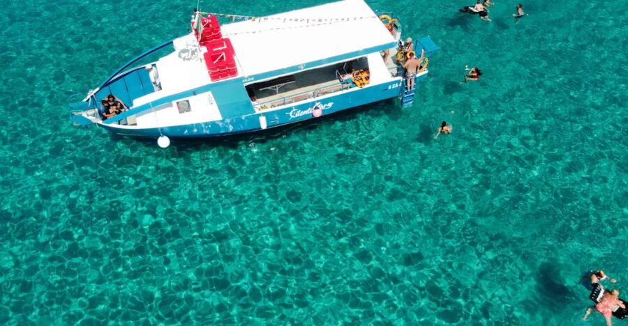 From Tropea: Capo Vaticano boat tour with snorkel & aperitif - The on-board atmosphere: music, dancing, and aperitivo time