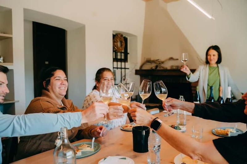 From Venice: Prosecco Hills and Wine Tasting Tour - Stop 1 in Valdobbiadene: vineyard tour and tastings with local bites