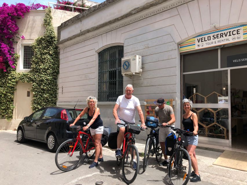 Lecce: City Highlights Guided Tour by Bike - Porta Napoli: Lecce’s monumental gateway moment