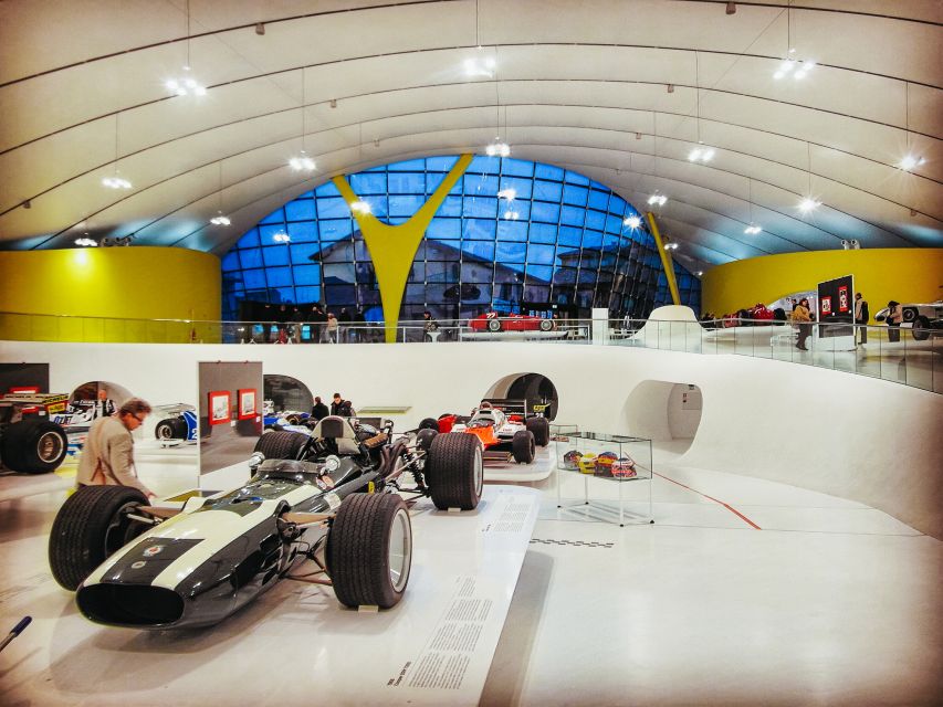 Maranello and Modena: Ferrari Museums Combo Tickets - Modena Museum: Enzo Ferrari in the yellow-hood building
