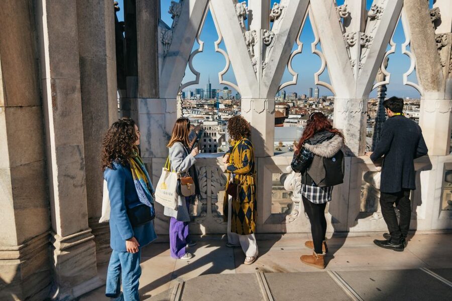 Milan: Duomo Rooftop and Cathedral Guided Tour with Tickets - Inside the Cathedral: Stained Glass, Artworks, and Faith in Stone