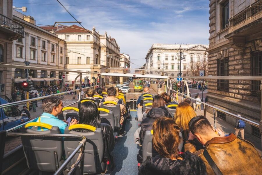 Milan: Gray Line Milan Open Tour Hop-On Hop-Off Bus Tour - On-board comfort: WiFi, USB, and what rainy Milan feels like