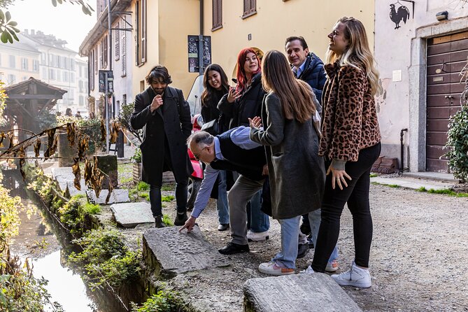 Milan: Navigli Food & Drinks Tour with Eating Europe - The in-between walk: shared balconies, washerwomen alley, and canal trade