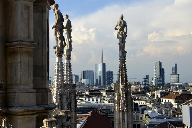 Milan Super Saver: Skip-the-line Duomo and Rooftop Tour - The Milan views: skyline, possible Alps, and the Virgin Mary on top