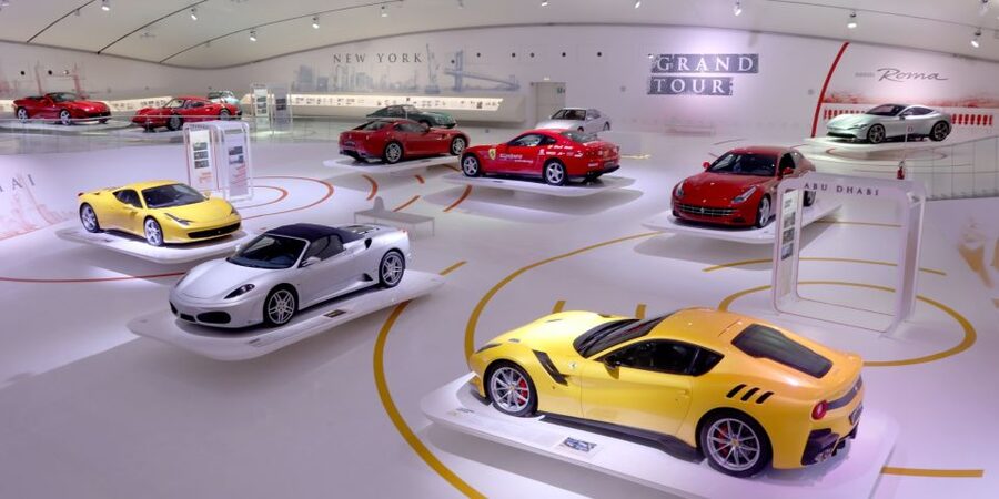 Modena: Enzo Ferrari Museum Entrance Ticket - Entering The Giant Yellow Hood In Modena