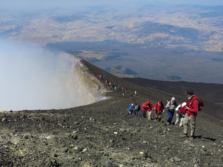 Mount Etna: Summit Crater Trek with Cable Car - Lava tunnel stop: the day turns from high drama to physical proof