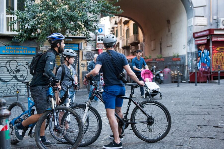 Naples: City Highlights Guided Bike Tour - Decumani and Via dei Tribunali: Greek layout, narrow streets, church clusters