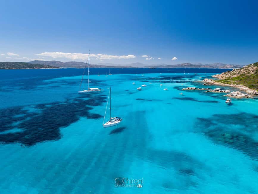 Olbia: Dolphin Watching & Snorkeling Boat Tour near Figarolo - Stop 1: Isola di Figarolo for snorkeling and a limestone coastline