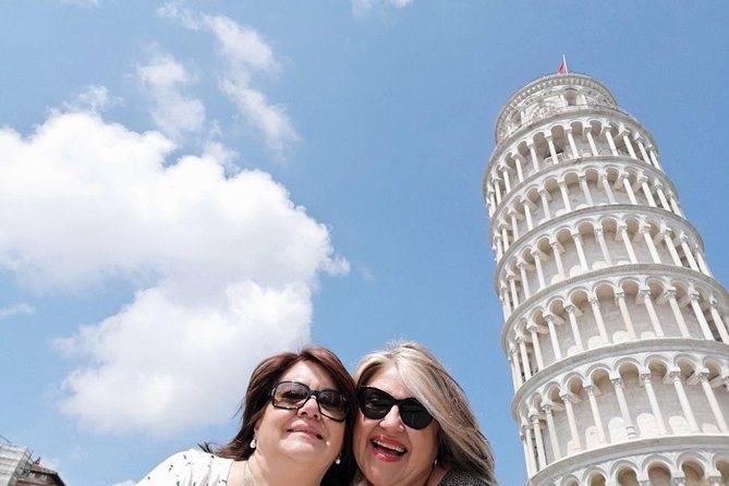 Pisa all inclusive: Baptistery, Cathedral and Leaning Tower guided tour - Getting started at Porta Santa Maria, find the flag, then breathe
