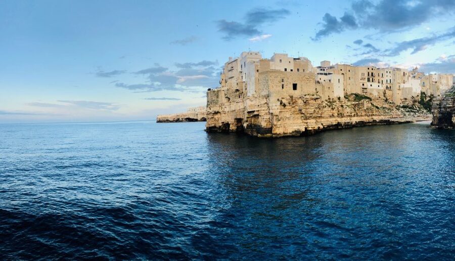 Polignano a Mare: Boat Trip, Swim & Cave with Aperitif - The starting run: Cala Paguro, Domenico Modugno, and first sea-level views