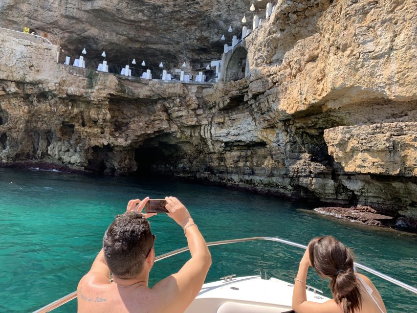Polignano a Mare: Cave Boat Tour with Aperitif - Abbazia di San Vito stop: photos, snacks, and your aperitif moment
