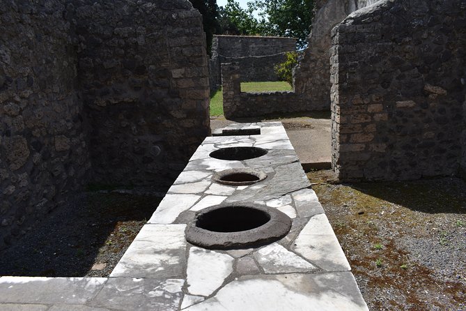 Pompeii Skip-the-line Tour with Archaeologist Guide - Theater and thermal bathhouse: performance and everyday social life