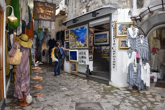 Positano & Amalfi Boat Tour from Naples with Light Lunch - Swim breaks, snacks, Caprese lunch, and the limoncello toast