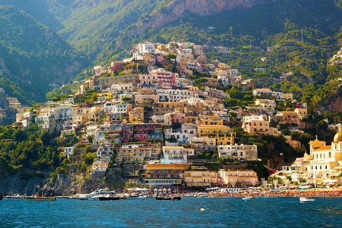 Positano & Amalfi Boat Tour from Naples with Light Lunch - Long day logistics, group size, and the motion on the water
