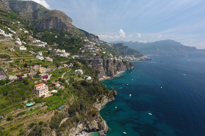 Private Amalfi Coast Boat Trip from Positano, Praiano or Amalfi - Positano from the sea: lungomare views, Grotta Pandora, and Tordigliano swims