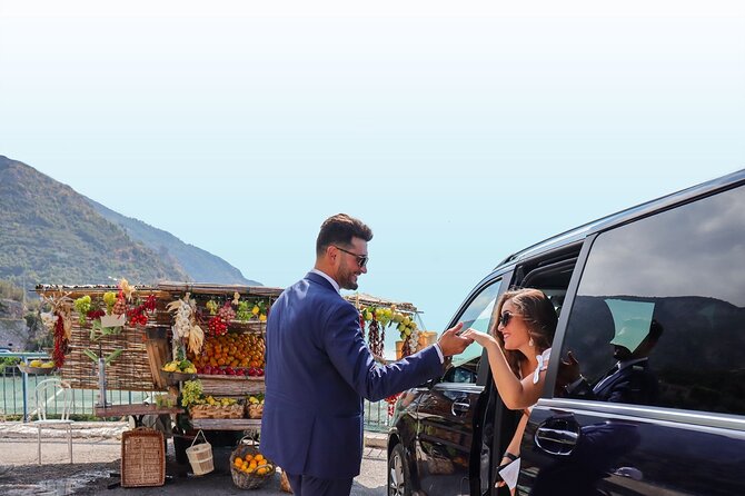 Private Amalfi Coast Day Tour from Sorrento or Naples - Positano at street level: Santa Maria Assunta, shops, and beach strolls