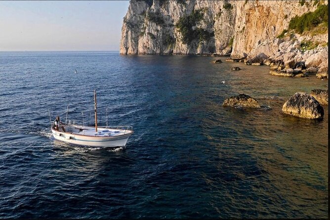 Private tour in a typical Capri boat - Stop-by-stop route: grottos, cliffs, and the views you came for
