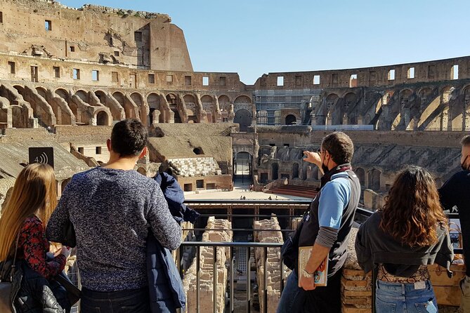 Rome: Colosseum, Palatine Hill and Roman Forum Guided Tour - Via Sacra to the Roman Forum: Arch of Titus and Sacred Street Sights