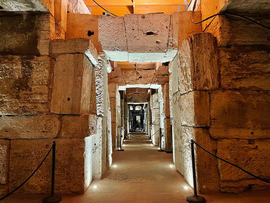 Rome: Colosseum Underground and Arena Tour - The Hypogeum tour walk: corridors, cages, drainage, and the elevator