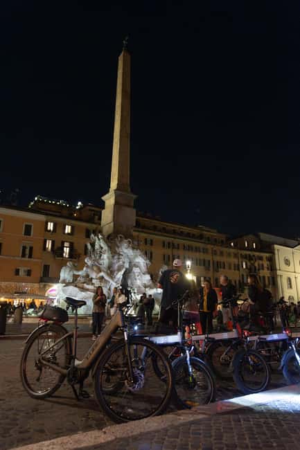 Rome: E-Bike Night Tour with Food and Wine Tasting - The tasting stop, wine included, and why it feels like value
