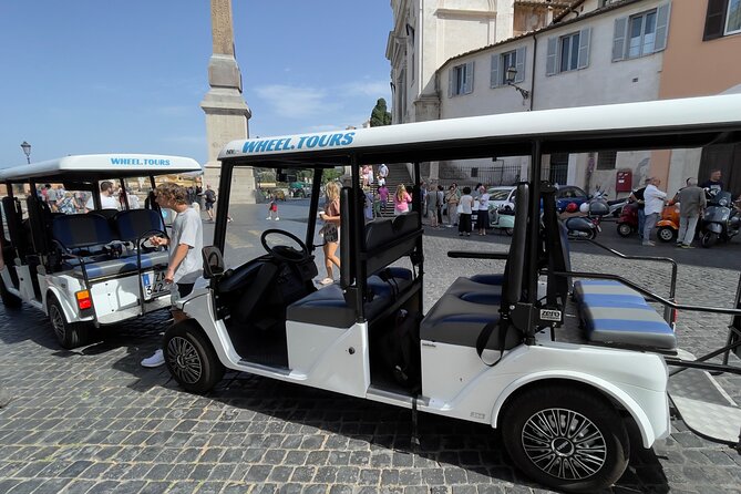 Rome Highlights City Tour by Golf Cart with Gelato - St. Peter’s Square drive-by: Bernini colonnade from the cart