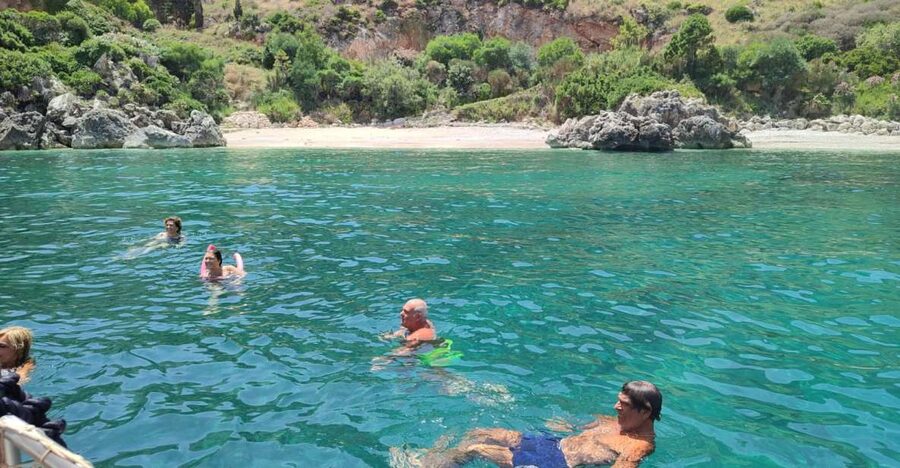 San Vito Lo Capo: Boat Trip with 3 Swimming Stops and Snacks - First swim stop at Cala ’Mpiso, where the water does the selling