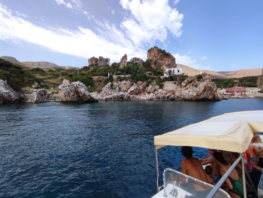 San Vito Lo Capo: Boat Trip with 3 Swimming Stops and Snacks - The onboard vibe: snacks, sweets, wine, and a relaxed tempo