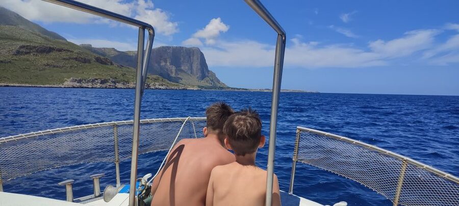 San Vito Lo Capo: Boat Trip with 3 Swimming Stops and Snacks - Guide language and how you’ll still follow the story