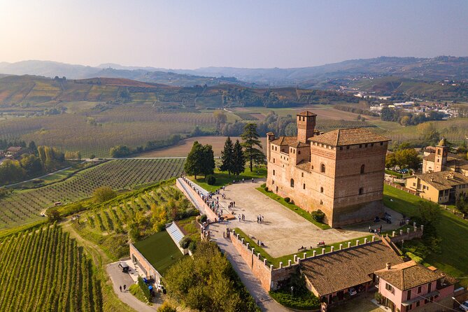 Small-Group Barolo Wine Tasting, Alba & UNESCO Piedmont Hills - Alba cobblestones, San Lorenzo cathedral, and truffle fair energy