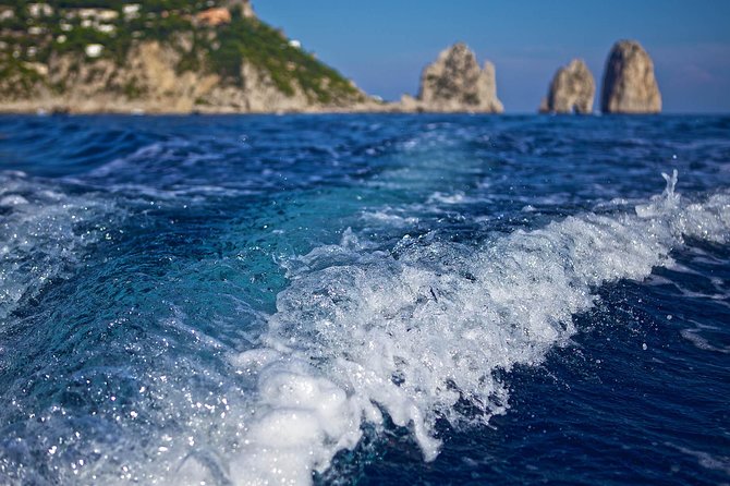 Small Group Capri Island Boat Ride with Swimming and Limoncello - Snacks, drinks, and limoncello: expect a light but fun service