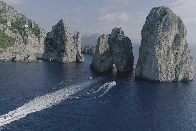Small Group Day Trip to Capri from Positano or Praiano - Leaving the harbor: Capri’s coastline, White Grotta, and quick photo stops