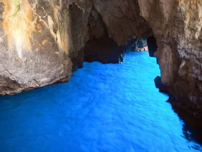 Taormina: Boat Tour with Aperitif on Isola Bella - Blue Grotto inside access: how the light show works