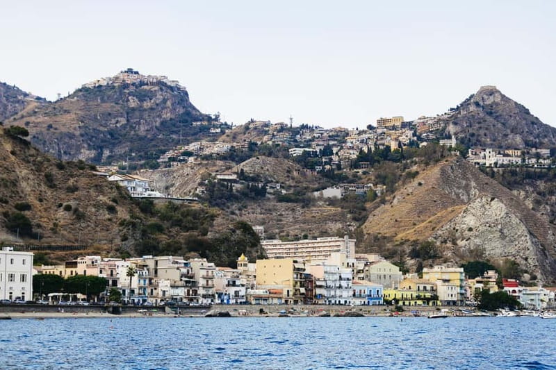 Taormina: Sunset Boat Tour with Dolphin Watching & Aperitif - Dolphin watching with an 80 percent chance, and real follow time