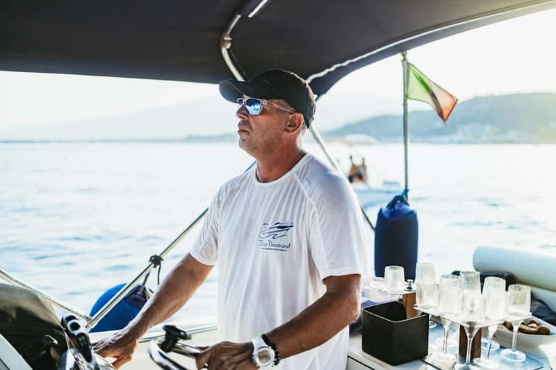 Taormina: Sunset Boat Tour with Dolphin Watching & Aperitif - Aperitif vibes: snacks and drinks after the sea time