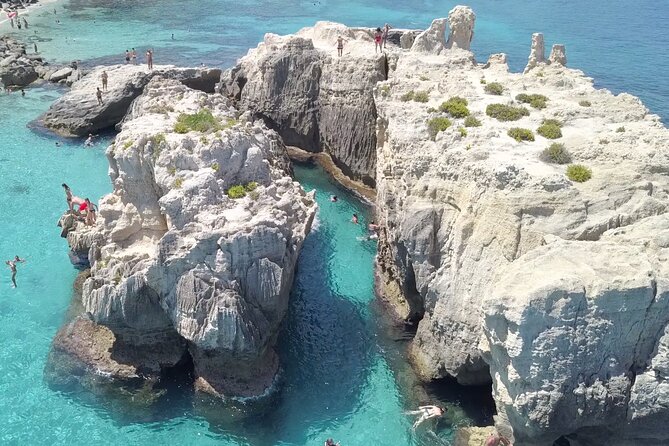 The best Boat Tour from Tropea to CapoVaticano, max 12 passengers - Spiaggia di Riaci: canyon-style swimming and easy snorkeling