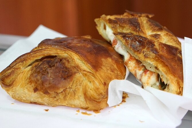 The Original Catania Street Food and Market Tour by Streaty - Entering Catania via Piazza del Duomo, then walking with purpose